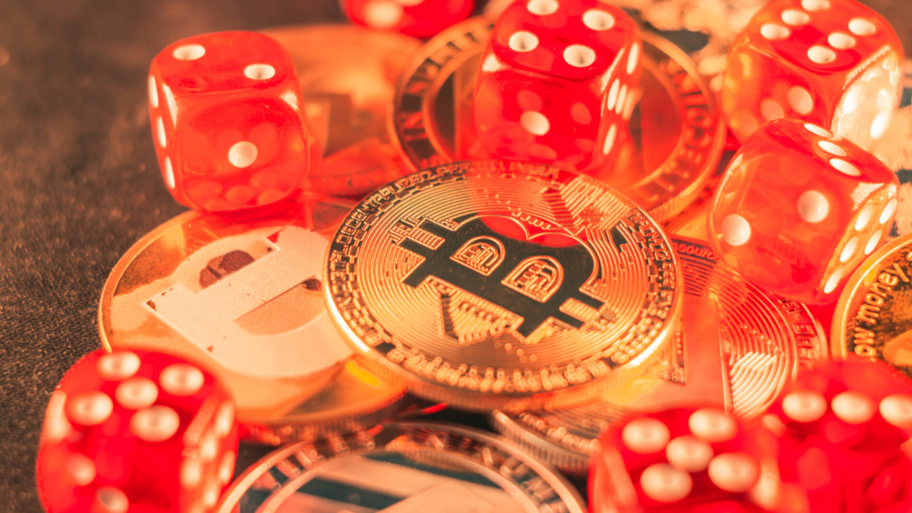 closeup-shot-some-bitcoins-red-dice