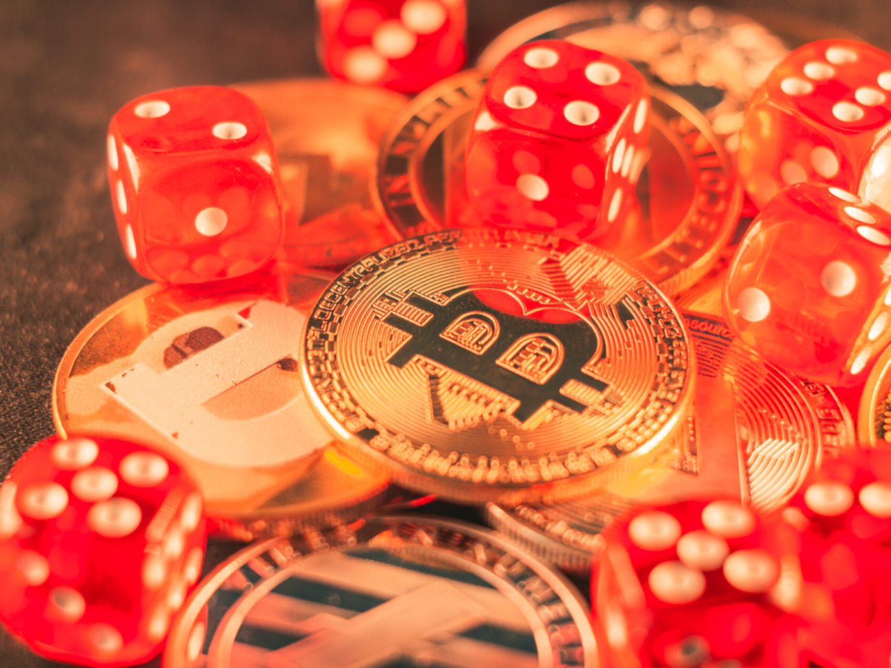 closeup-shot-some-bitcoins-red-dice