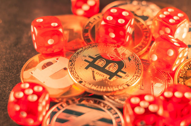 closeup-shot-some-bitcoins-red-dice